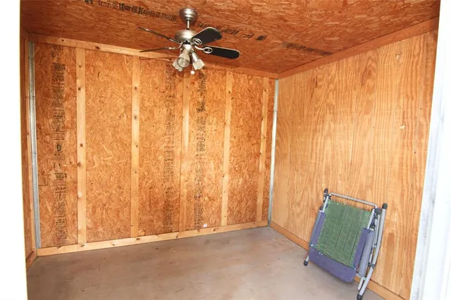a view of a room with a window and a shower curtain