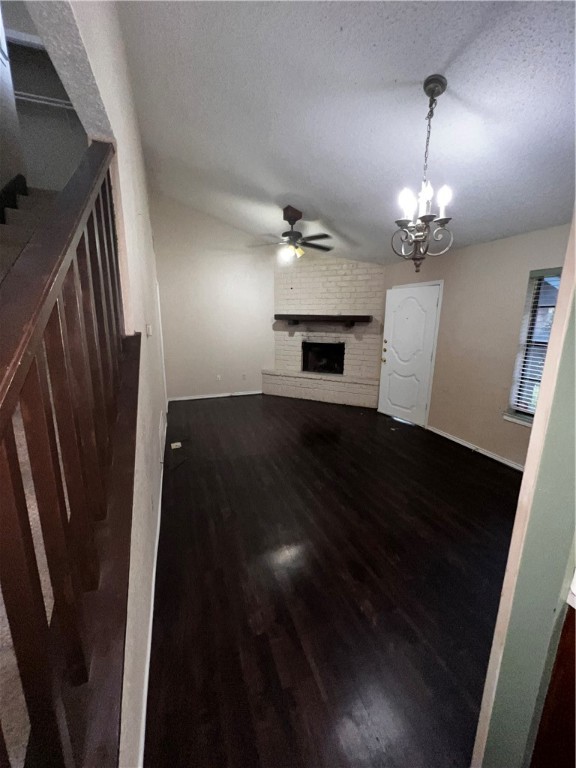 5180 Middlecoff Circle, Unit B Corpus Christi, TX 78413 - Photo 6 of 11 an empty room with wooden floor and staircase