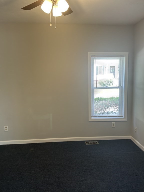 46 Tatman Street Worcester, MA 01607 - Photo 13 of 31 an empty room with a window