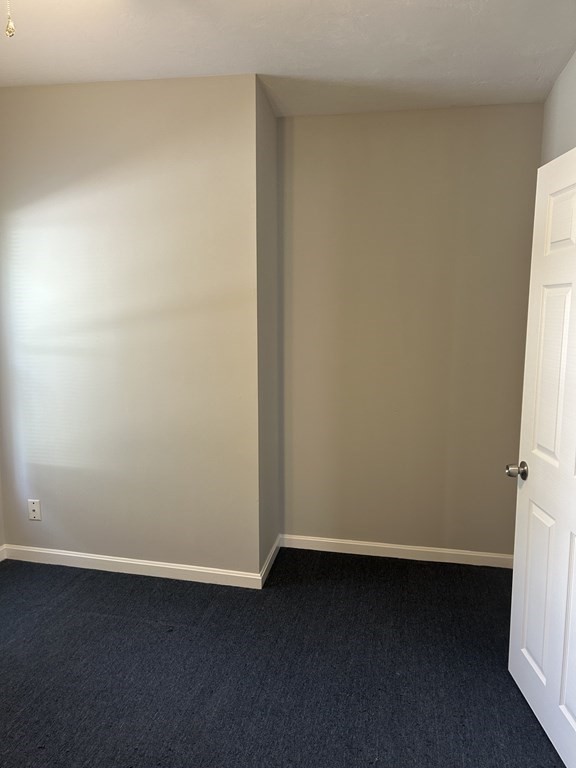 46 Tatman Street Worcester, MA 01607 - Photo 14 of 31 close up of a white marble wall