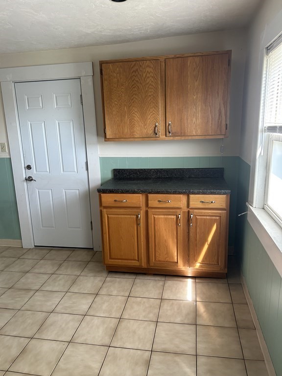 46 Tatman Street Worcester, MA 01607 - Photo 17 of 31 a view of a utility room with cabinets