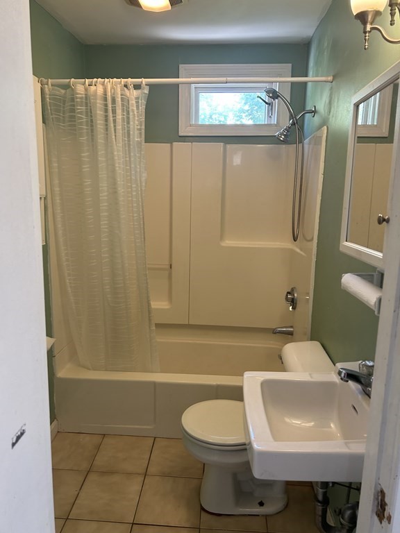 46 Tatman Street Worcester, MA 01607 - Photo 22 of 31 a bathroom with a sink toilet and shower