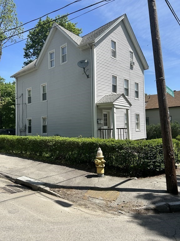 46 Tatman Street Worcester, MA 01607 - Photo 30 of 31 a front view of a house with a yard