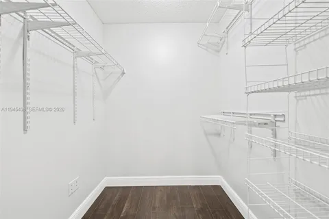 a view of a room with racks on the wall