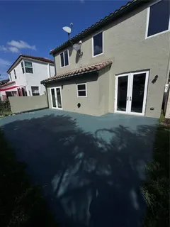 a front view of a house with yard