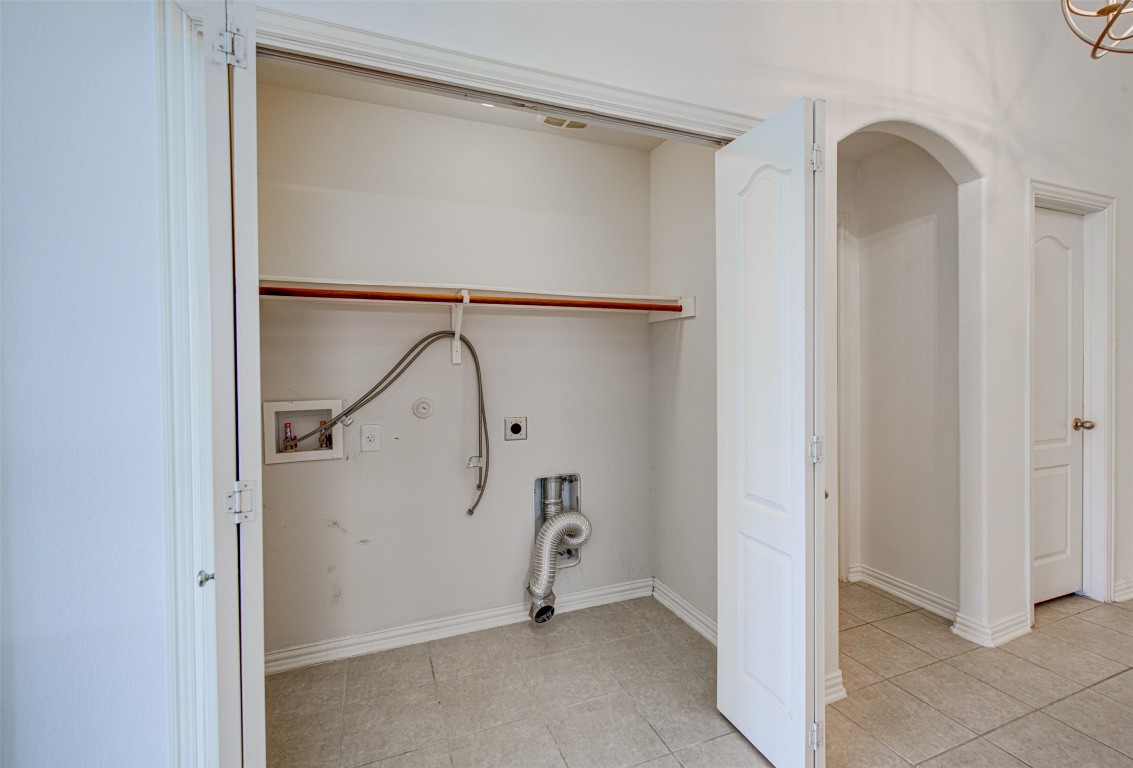 239 Pond View Pass Buda, TX 78610 - Photo 19 of 30 Laundry room with washer hookup and hookup for an electric dryer