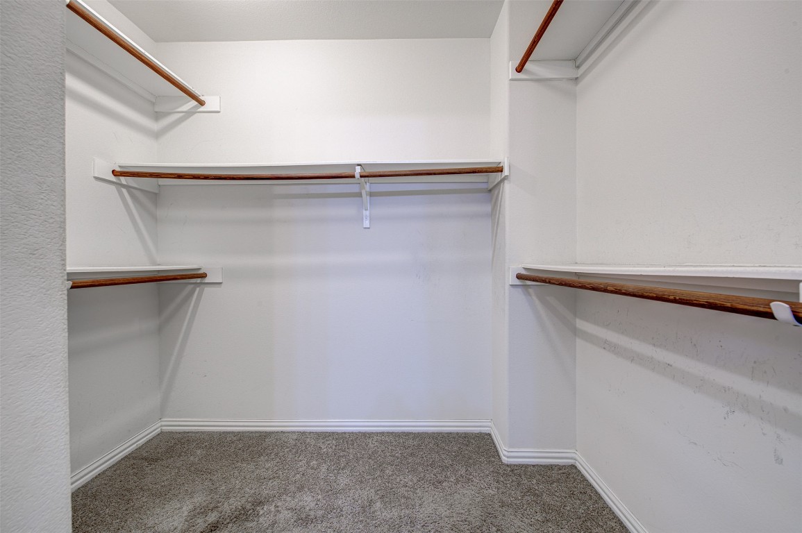 239 Pond View Pass Buda, TX 78610 - Photo 24 of 30 Spacious closet with light colored carpet