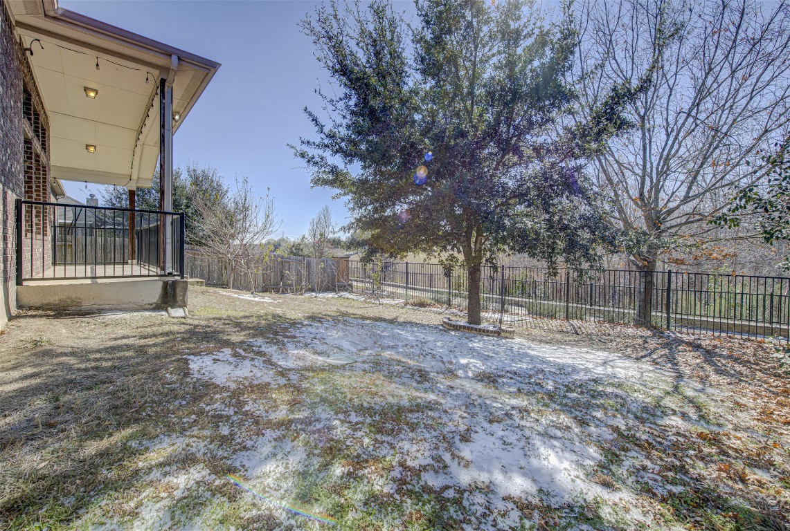 239 Pond View Pass Buda, TX 78610 - Photo 27 of 30 View of fenced backyard
