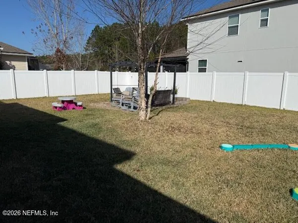 a view of outdoor space and yard