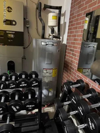a kitchen with a stove and a refrigerator