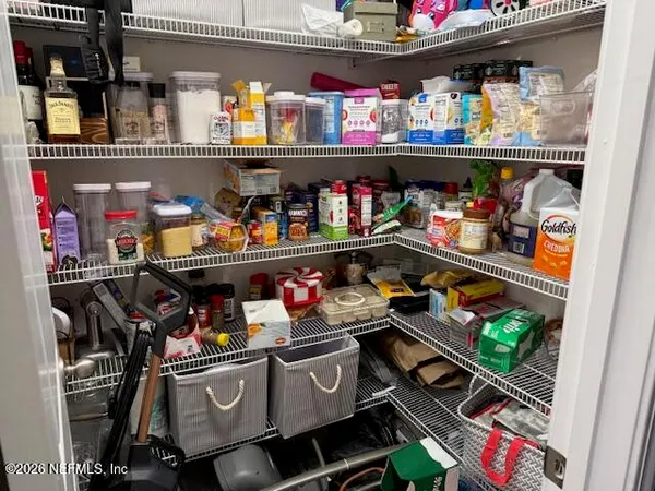 a store room with lots of storage and fruits