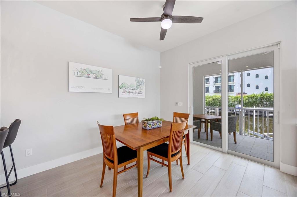 1395 Curlew Avenue, Unit 43 Naples, FL 34102 - Photo 9 of 24 a dining room with furniture and window