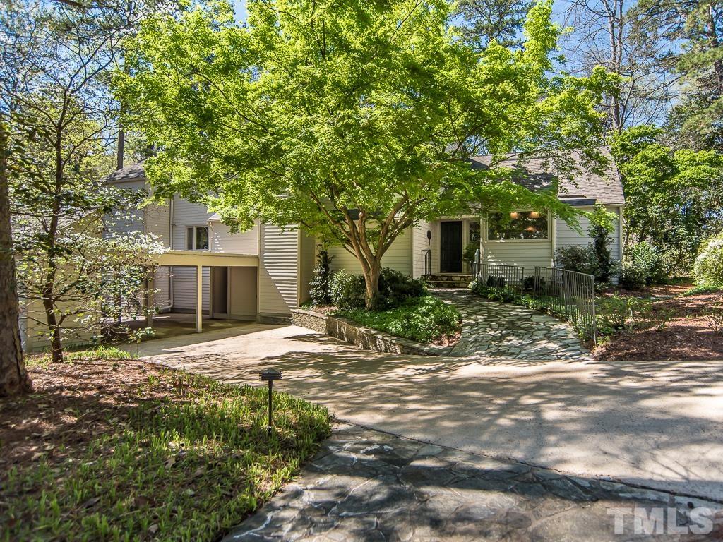 3215 Kenly Court Raleigh, NC 27607 - Photo 1 of 3 a view of a house with a tree