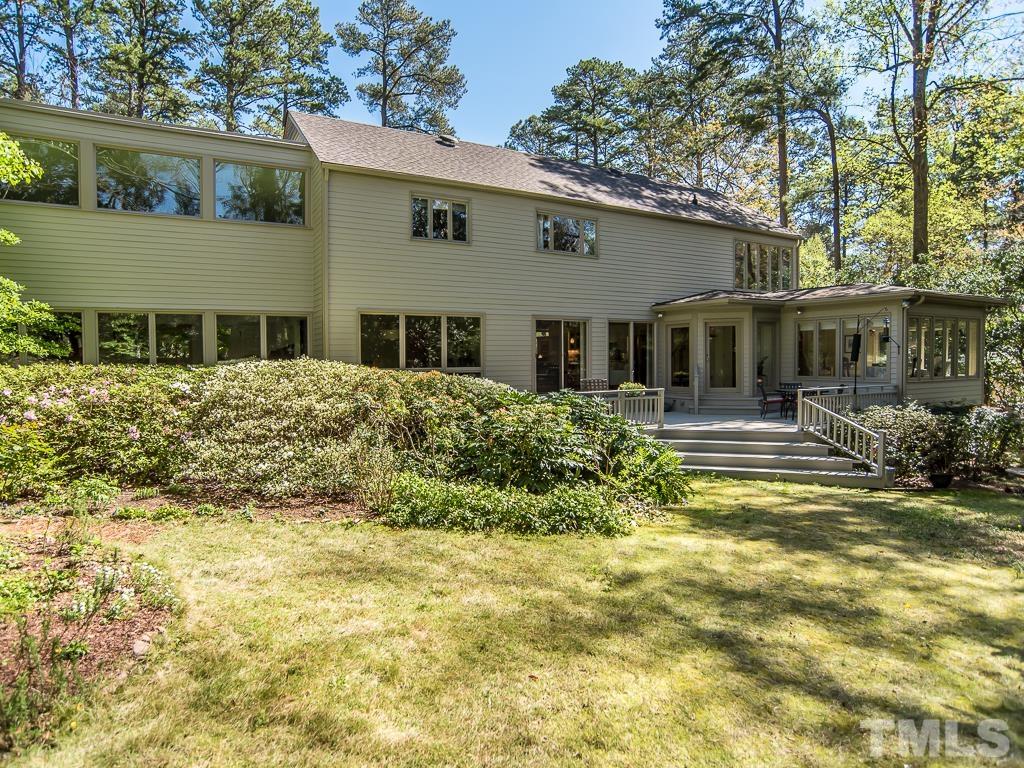 3215 Kenly Court Raleigh, NC 27607 - Photo 3 of 3 a front view of a house with a yard