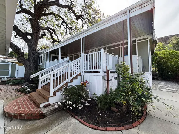 a house with trees in front of it