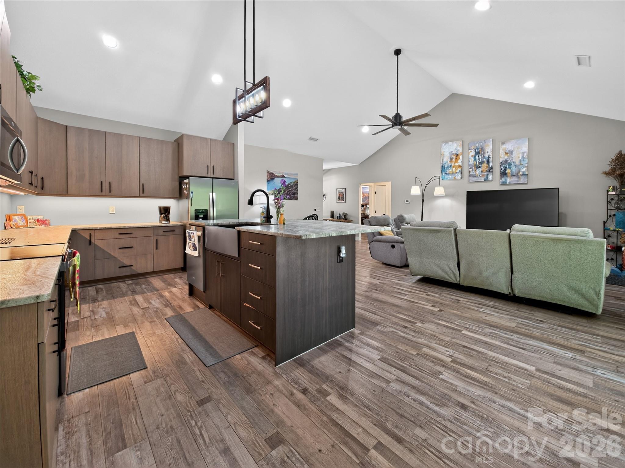 278 Hunters Trace Rutherfordton, NC 28139 - Photo 21 of 33 a large kitchen with cabinets and a wooden floor