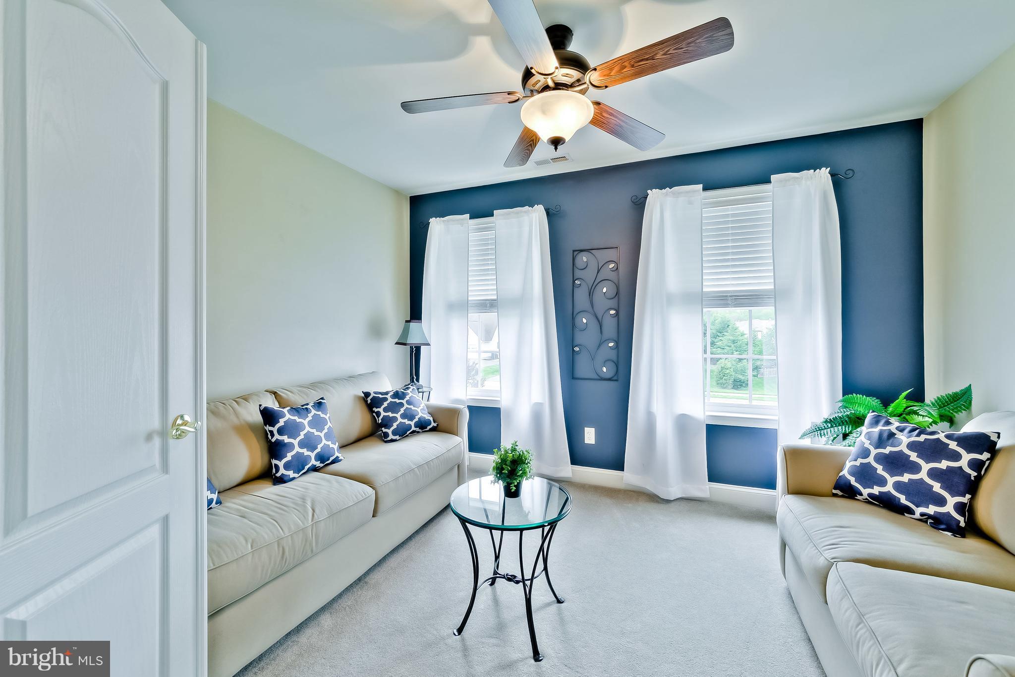 5704 New Forge Road White Marsh, MD 21162 - Photo 15 of 30 a living room with furniture and a large window