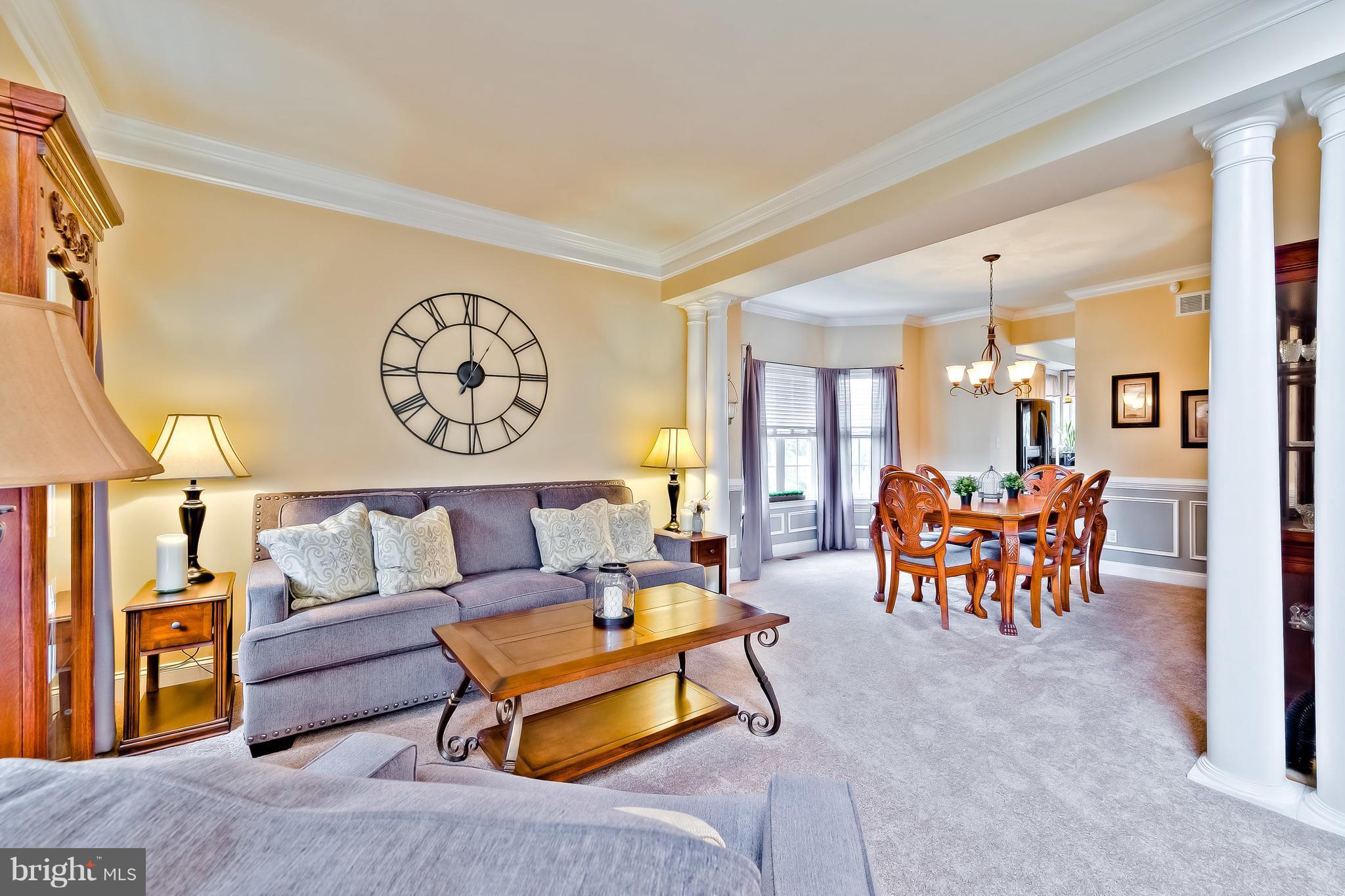 5704 New Forge Road White Marsh, MD 21162 - Photo 3 of 30 a living room with furniture and a table