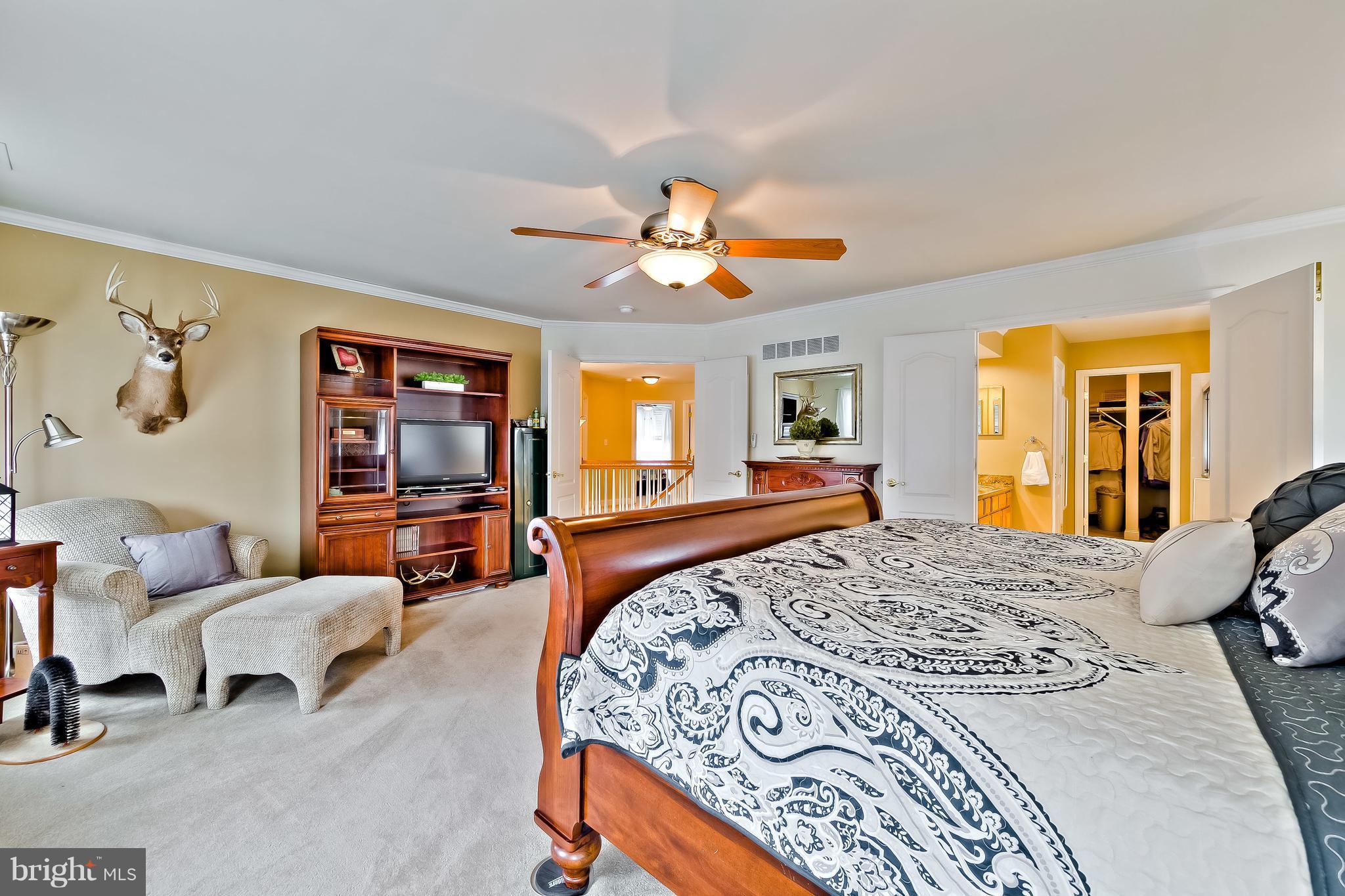 5704 New Forge Road White Marsh, MD 21162 - Photo 22 of 30 a bedroom with furniture and a large window