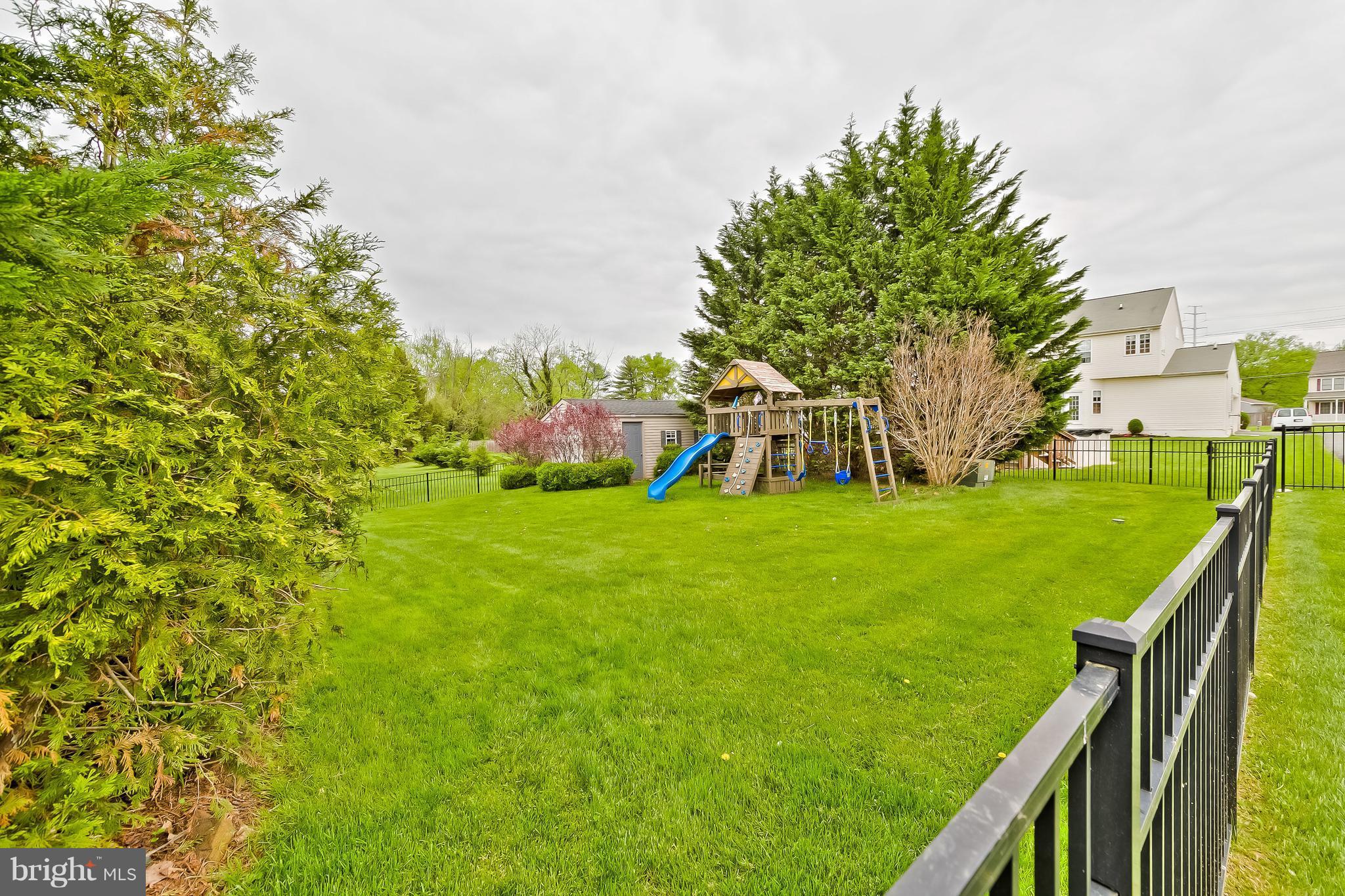5704 New Forge Road White Marsh, MD 21162 - Photo 30 of 30 a view of an house with backyard and a tree