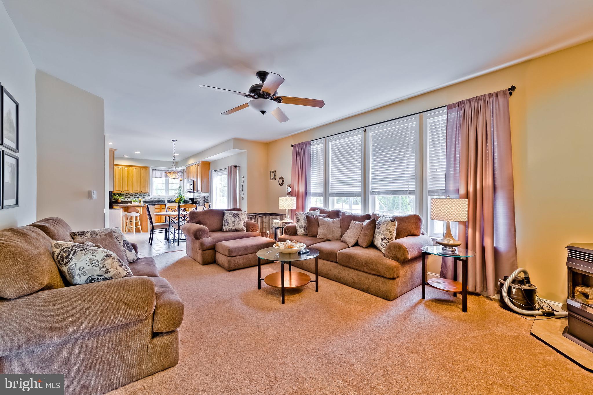 5704 New Forge Road White Marsh, MD 21162 - Photo 7 of 30 a living room with furniture and a large window
