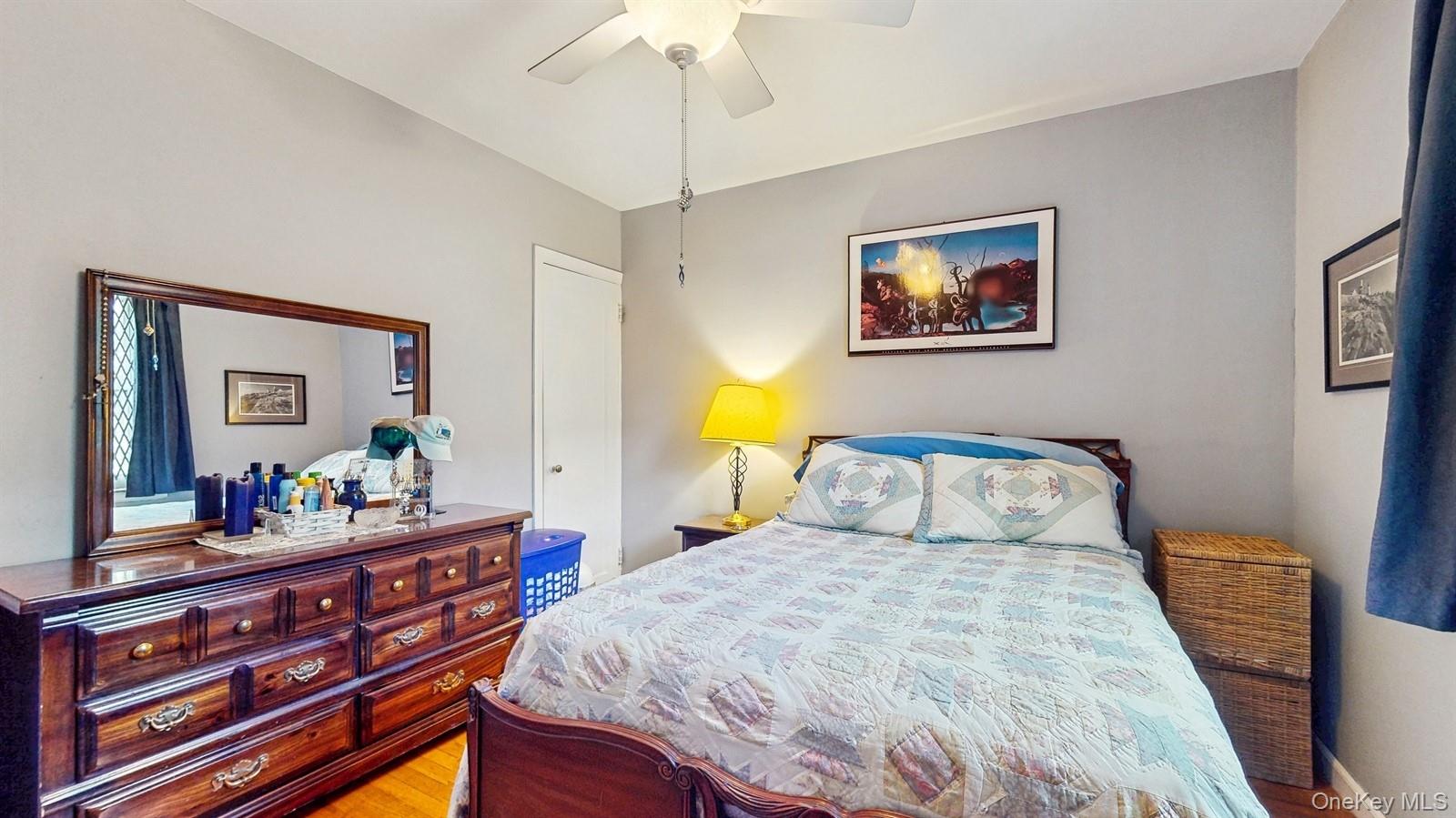 755 Bronx River Road, Unit 6C Bronxville, NY 10708 - Photo 17 of 22 Bedroom featuring wood finished floors and a ceiling fan