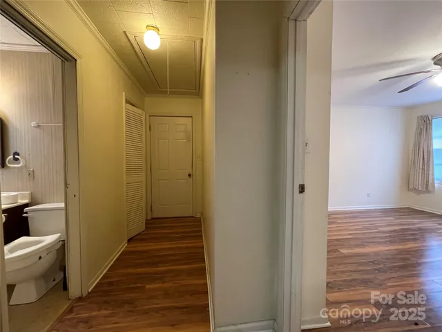 a view of a bathroom from the hallway