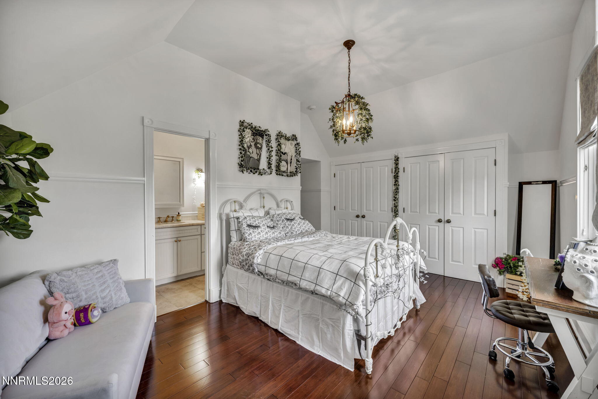 4010 Canyon Drive Reno, NV 89519 - Photo 10 of 147 a bed room with a bed and a chandelier