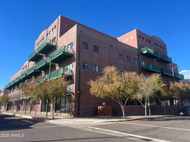 a view of a building with a street