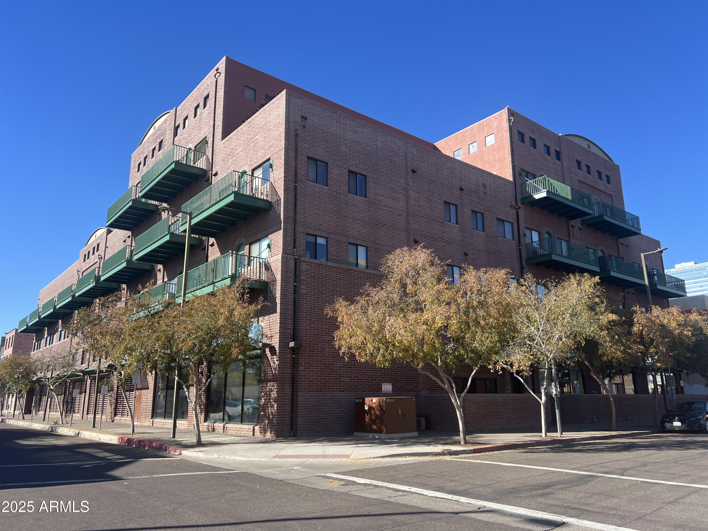 a view of a building with a street