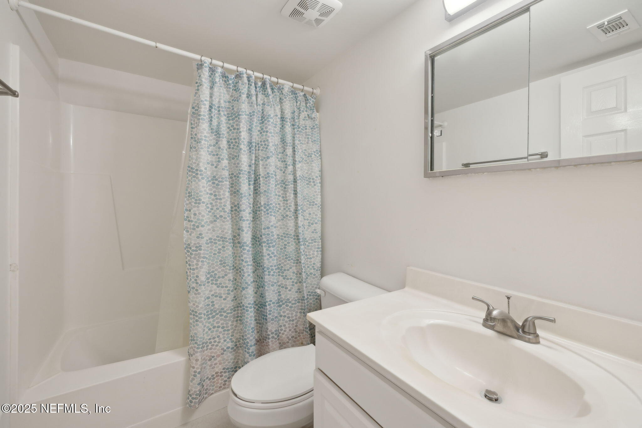125 River Bend Road, Unit BLD D Welaka, FL 32193 - Photo 24 of 53 a bathroom with a sink a toilet and shower