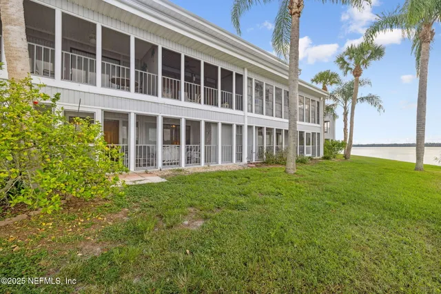 a view of a swimming pool with a lake view