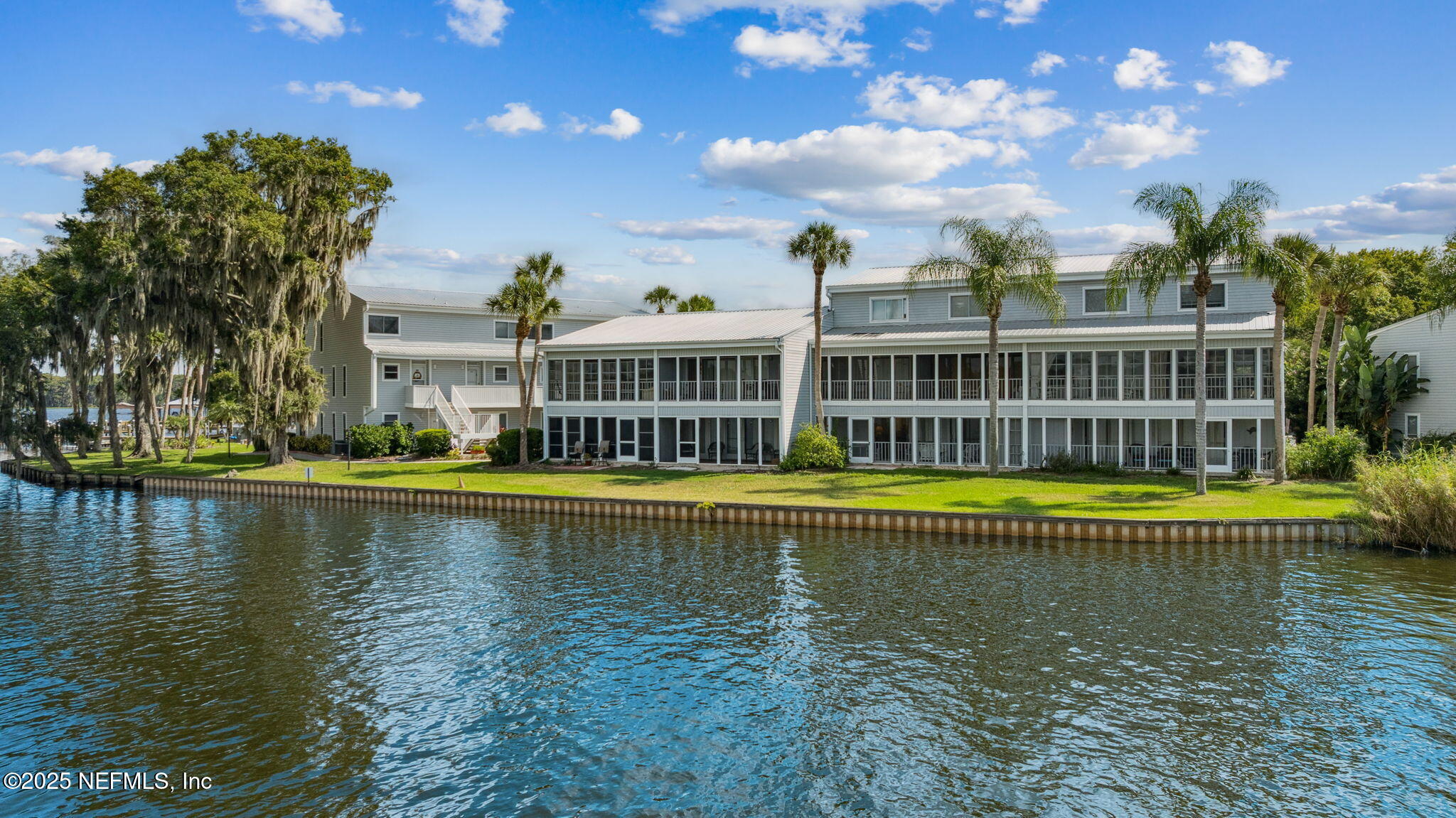 125 River Bend Road, Unit BLD D Welaka, FL 32193 - Photo 32 of 53 a view of a swimming pool with a lake view