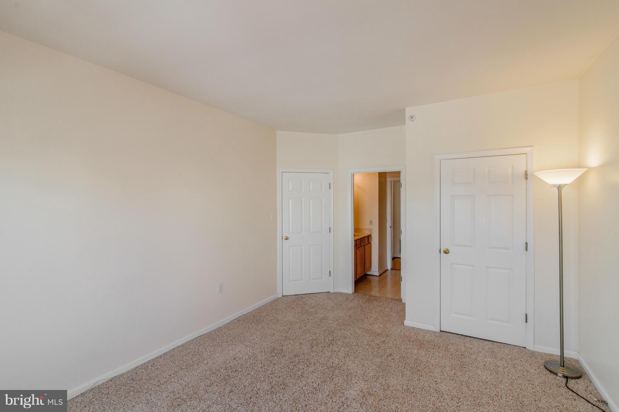 12008 Amber Ridge Circle, Unit A301 Germantown, MD 20876 - Photo 14 of 22 a view of an empty room