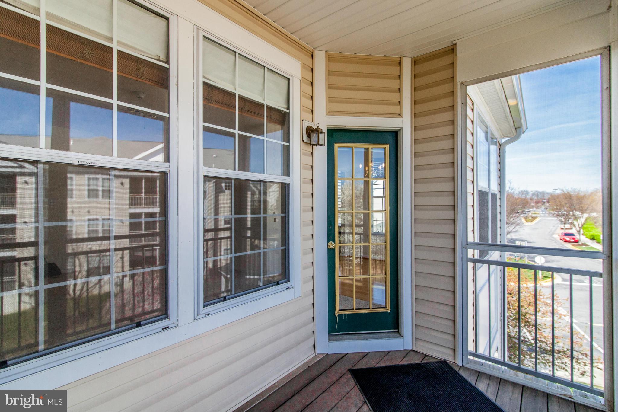 12008 Amber Ridge Circle, Unit A301 Germantown, MD 20876 - Photo 17 of 22 a view of front door