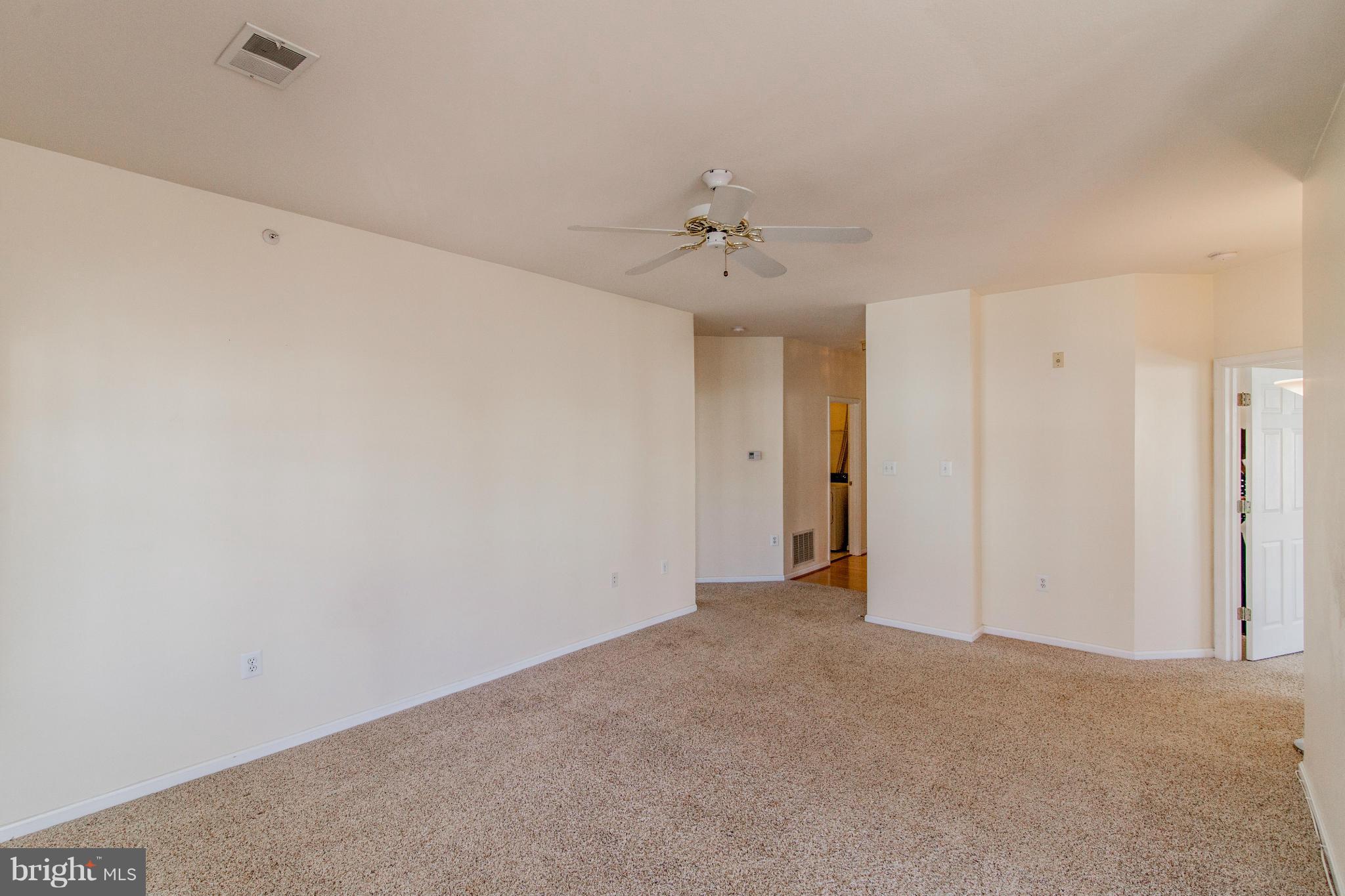 12008 Amber Ridge Circle, Unit A301 Germantown, MD 20876 - Photo 8 of 22 a view of an empty room