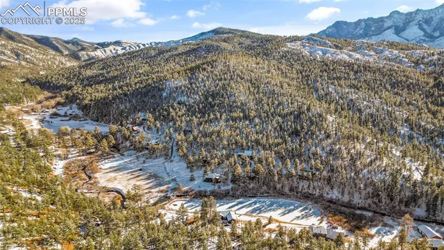 a view of mountains and valleys