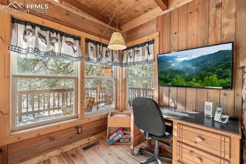 15103 Rainbow Road Sedalia, CO 80135 - Photo 9 of 48 a view of a chairs and table in a balcony