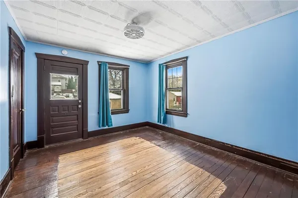 an empty room with windows