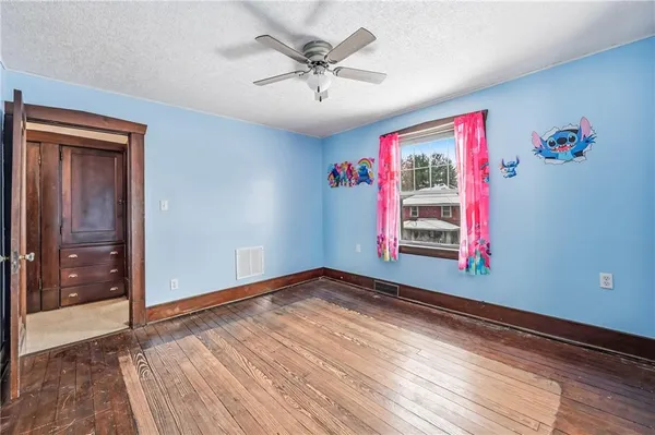 wooden floor and windows in a room