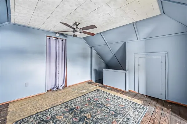 a view of a hallway with a chandelier