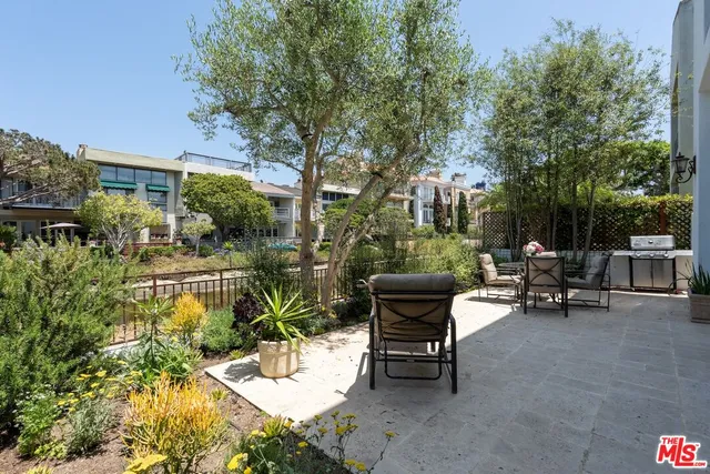 a view of a bench in a patio