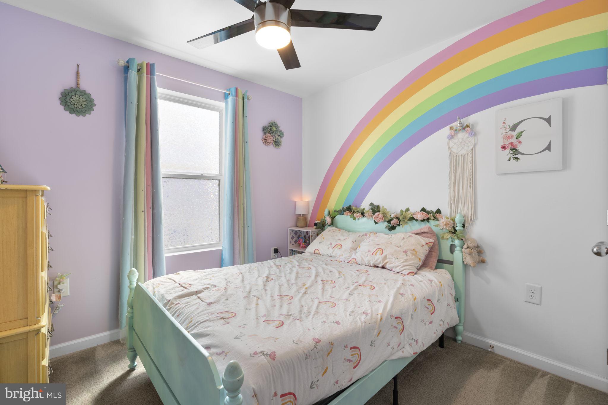 465 Carvel Beach Road Carvel Beach, MD 21226 - Photo 13 of 30 a bedroom with a bed and a window