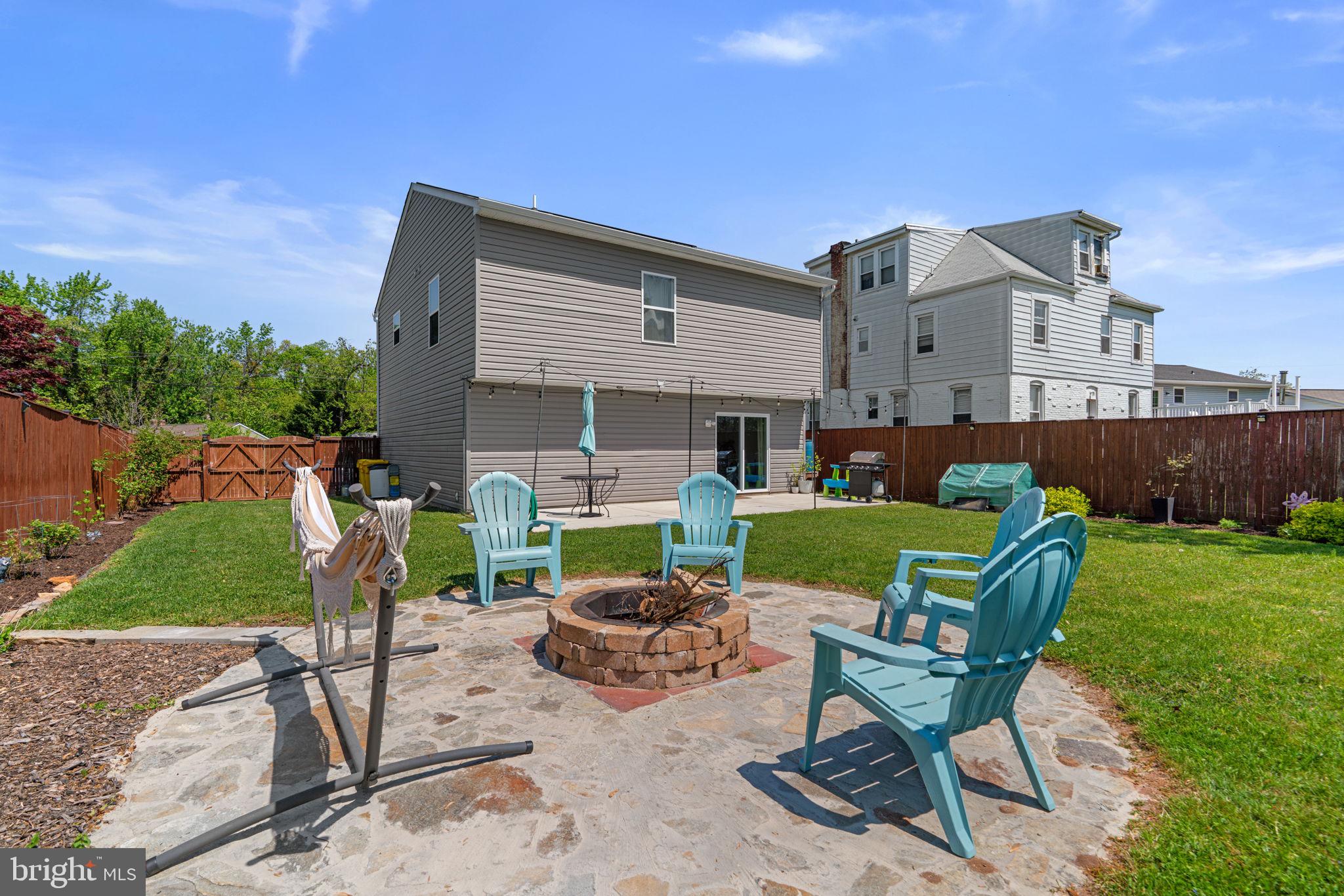 465 Carvel Beach Road Carvel Beach, MD 21226 - Photo 24 of 30 a view of backyard of house with seating space