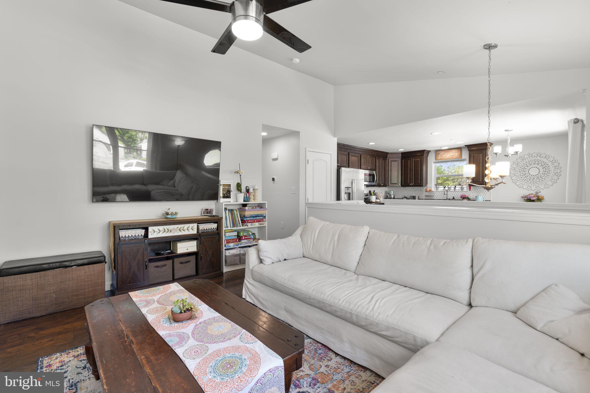 465 Carvel Beach Road Carvel Beach, MD 21226 - Photo 4 of 30 a living room with furniture and a flat screen tv