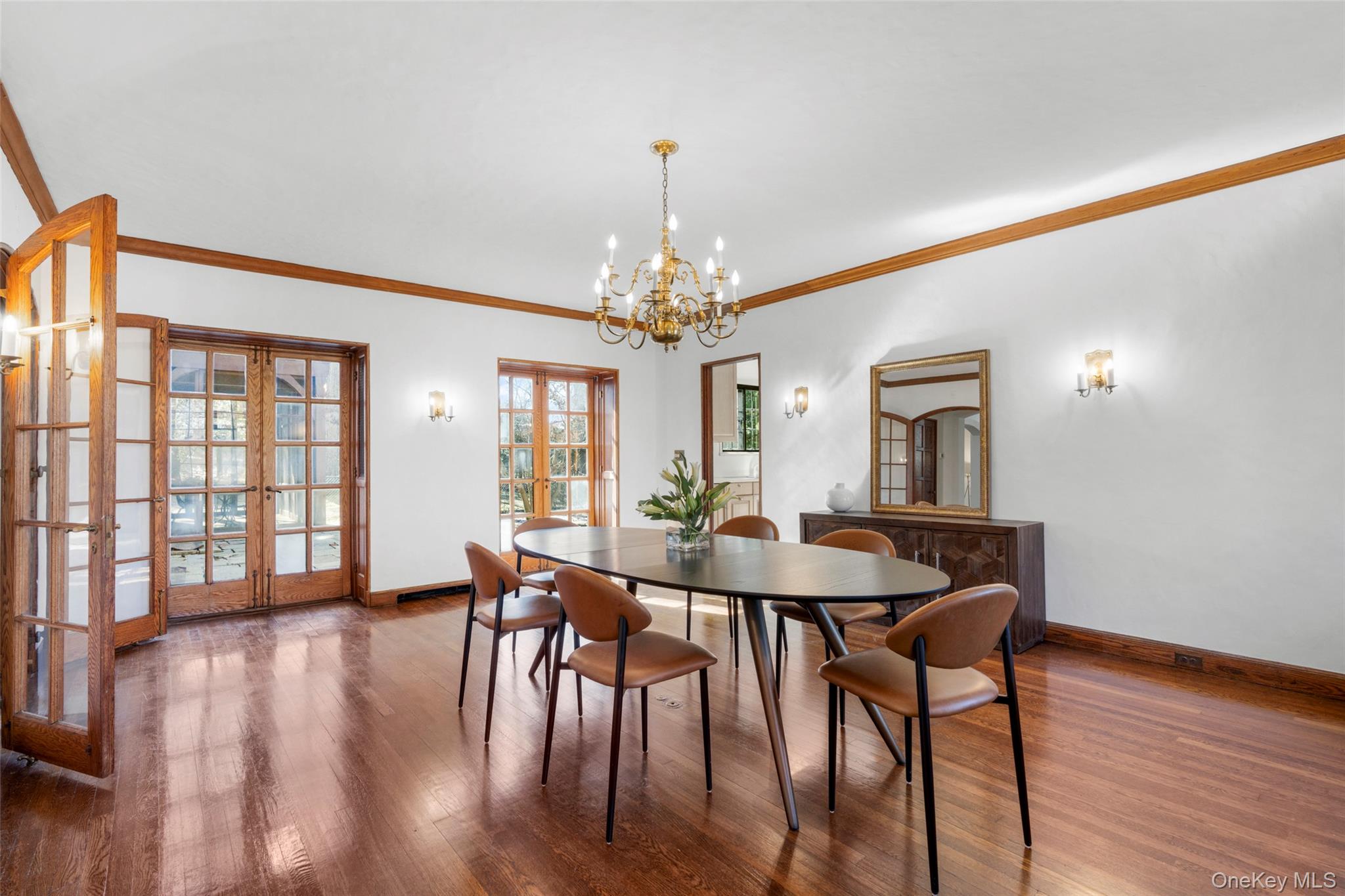 60 Wildwood Road New Rochelle, NY 10804 - Photo 14 of 49 a view of a dining room with furniture window and wooden floor
