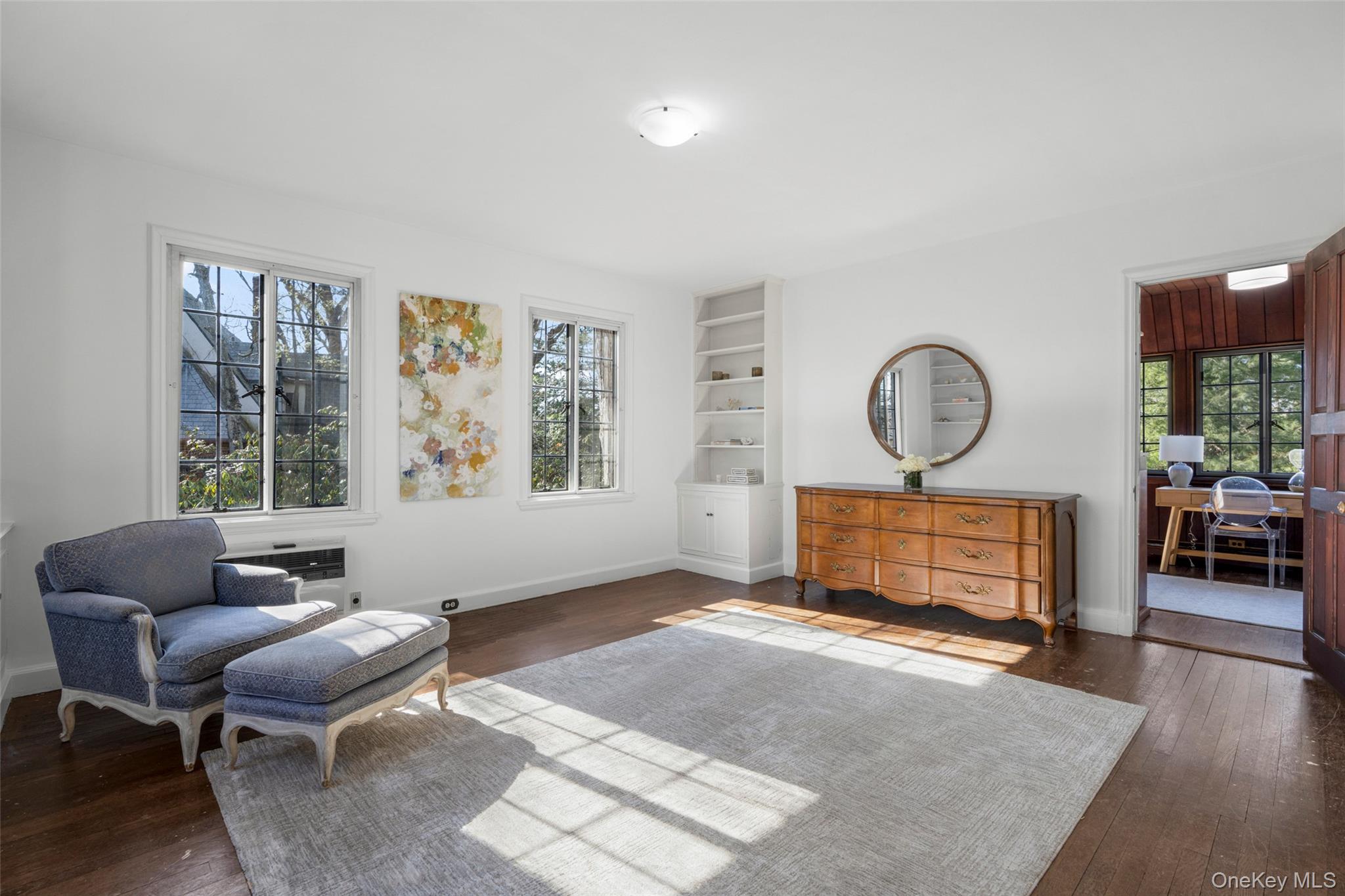 60 Wildwood Road New Rochelle, NY 10804 - Photo 24 of 49 a living room with furniture a rug and a window