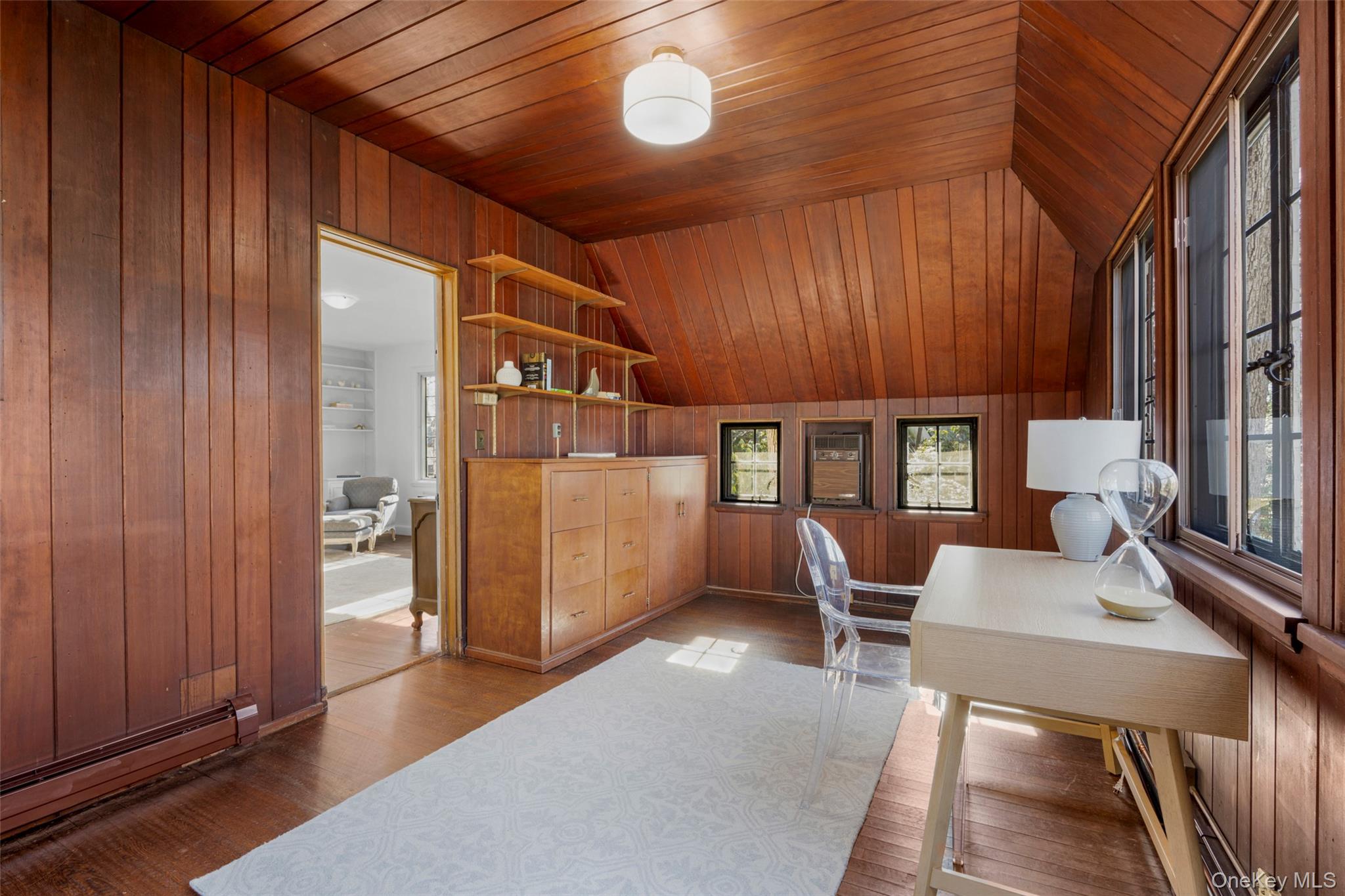 60 Wildwood Road New Rochelle, NY 10804 - Photo 25 of 49 a workspace with furniture window and wooden floor
