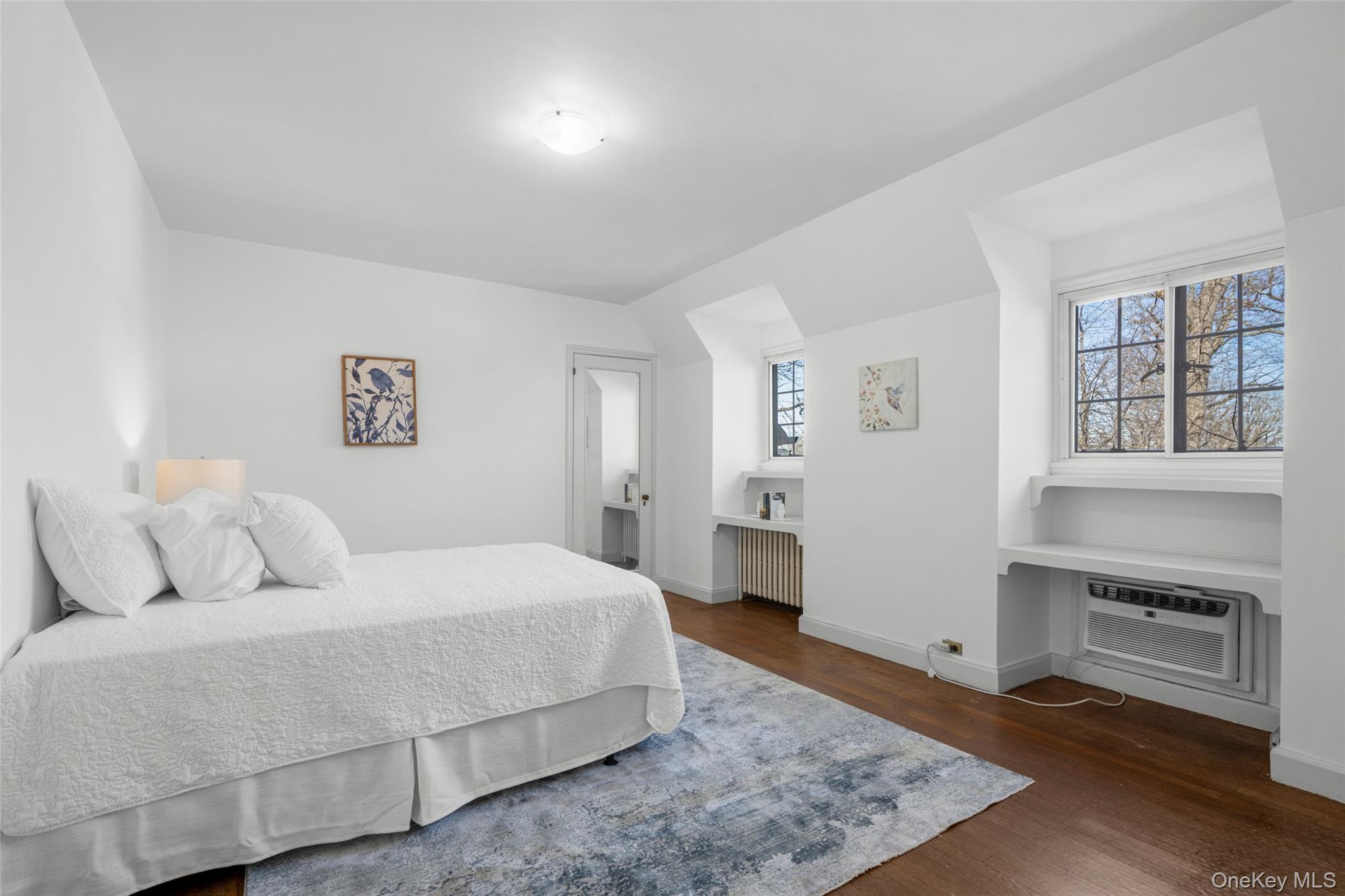 60 Wildwood Road New Rochelle, NY 10804 - Photo 28 of 49 a bedroom with a large bed and a view of bedroom