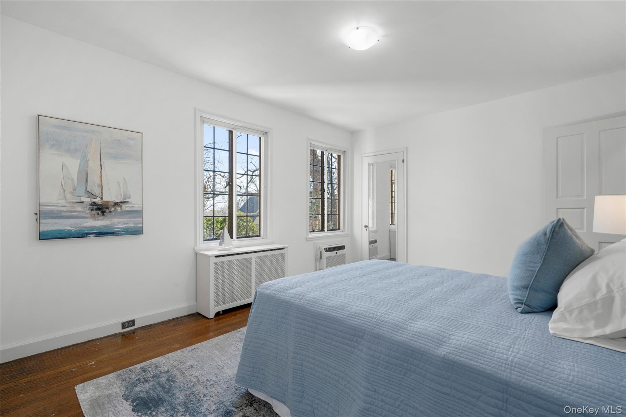 60 Wildwood Road New Rochelle, NY 10804 - Photo 29 of 49 a bedroom with a bed and a window